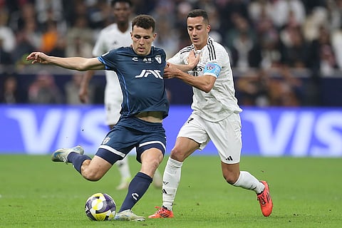 Intercontinental Cup 2024: CF Pachuca's Oussama Idrissi and Real Madrid's Lucas Vazquez fight for the ball