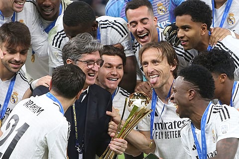 Intercontinental Cup 2024: Real Madrid's players celebrate with the trophy