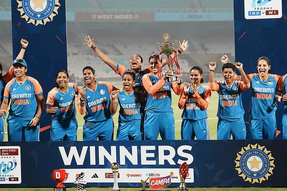 | Photo: PTI/Kunal Patil : IND-W vs WI-W 3rd T20I: Indian players celebrating with the trophy after the win