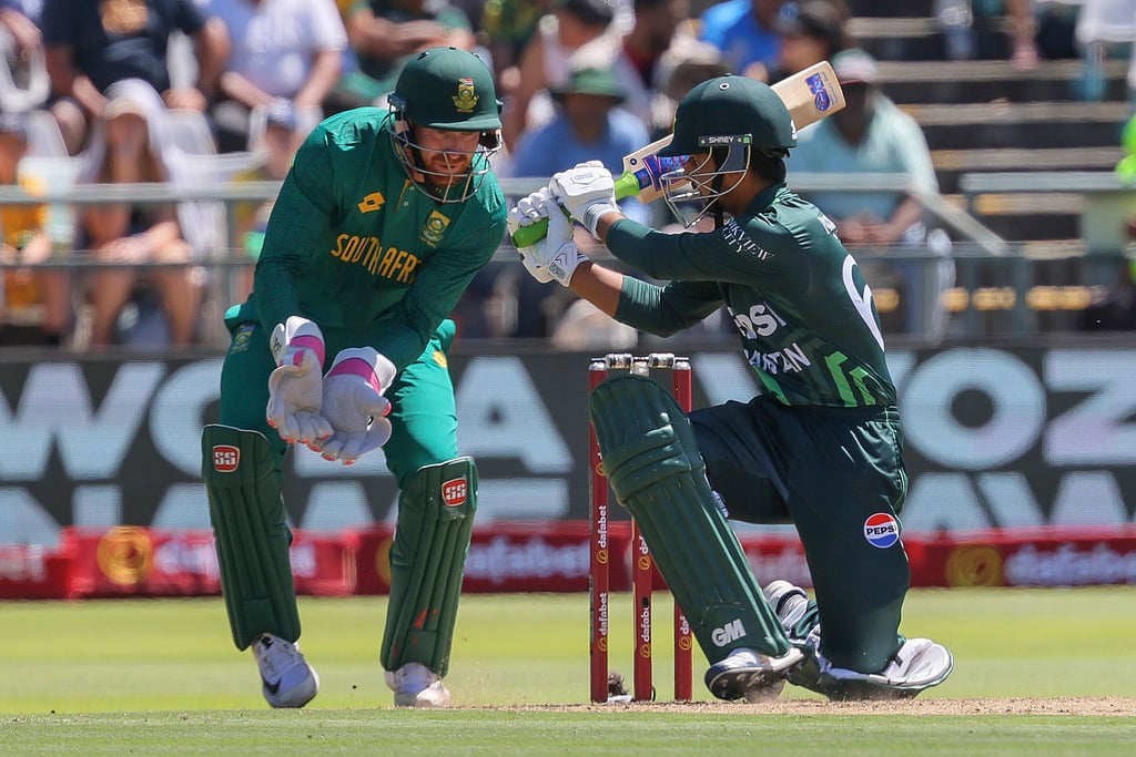 AP : Pakistan batsman Babar Azam, right, plays the ball while South African wicketkeeper Heinrich Klaasen, left, watches on during the second ODI International cricket match between South Africa and Pakistan, at Newlands Stadium, Cape Town, South Africa, Thursday, Dec. 19, 2024.