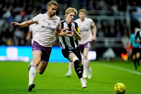 EFL Cup Quarter-Finals: Newcastle United's Anthony Gordon and Brentford's Kristoffer Ajer battle for the ball