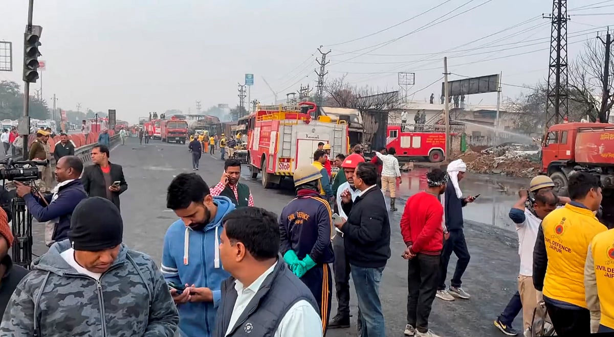 PTI : Fire tenders and people near the site of the accident after a truck loaded with a chemical collided with some other vehicles and caught fire on the Jaipur-Ajmer Highway, in Jaipur, Friday, Dec. 20, 2024 |