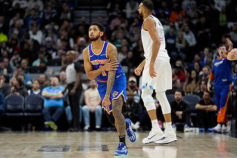 NBA: Knicks guard Cameron Payne (1) celebrates after making a 3-point shot