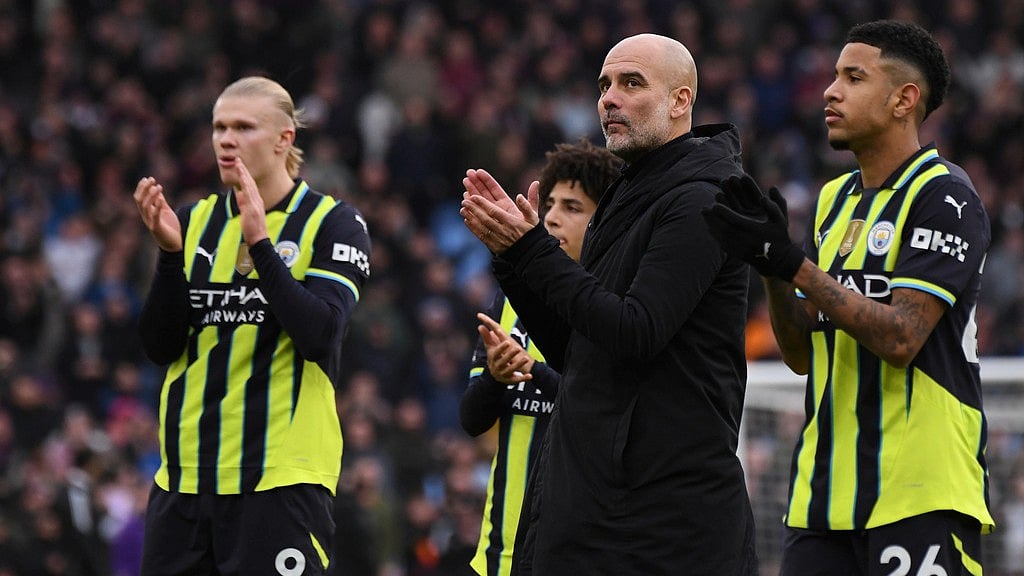 AP : Manchester City's head coach Pep Guardiola and players greet fans at the end of the English Premier League match against Aston Villa, at Villa Park in Birmingham.