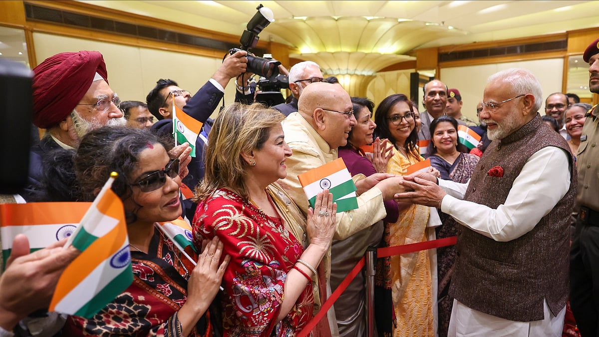 X/Narendra Modi : PM Narendra Modi with the members of the Indian community in Kuwait