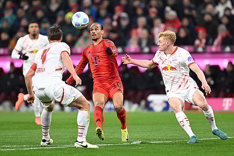 Bundesliga 2024-25: Munich's Leroy Sane in action with Leipzig's Willi Orban and Nicolas Seiwald