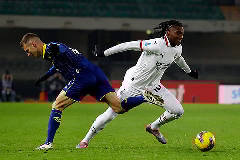 Serie A 2024-25: Verona's Darko Lazovic, left, passes AC Milan's Rafael Leao