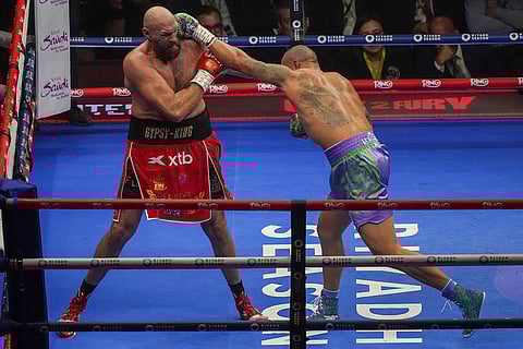 WBA, WBO, and WBC heavyweight title Tyson Fury Oleksandr Usyk