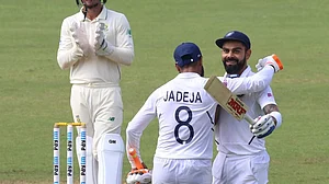X/ICC : Virat Kohli with Ravindra Jadeja.
