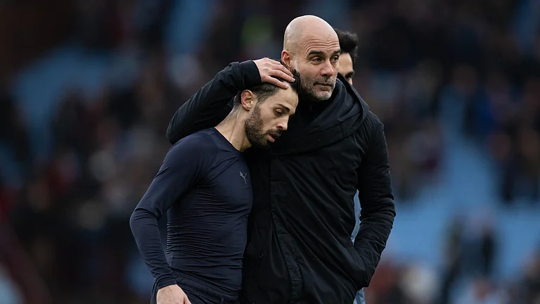 Pep Guardiola and Bernardo Silva - null