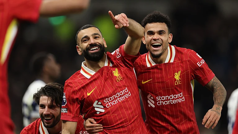 Mohamed Salah celebrates with Luis Diaz - null