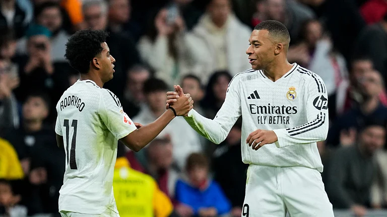 Kylian Mbappe celebrating with Rodrygo - null