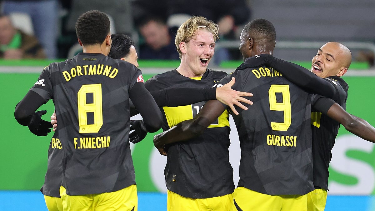 Borussia Dortmund celebrate their first goal against Wolfsburg