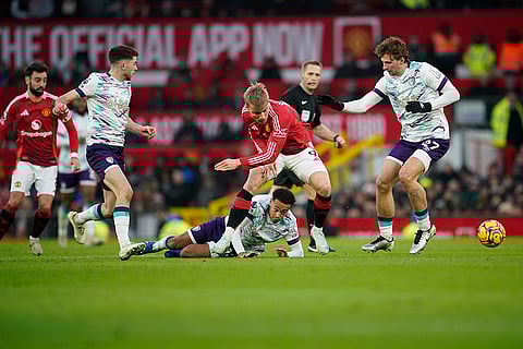 EPL 2024-25: Manchester United's Rasmus Hojlund challenges for the ball with Bournemouth's Tyler Adams