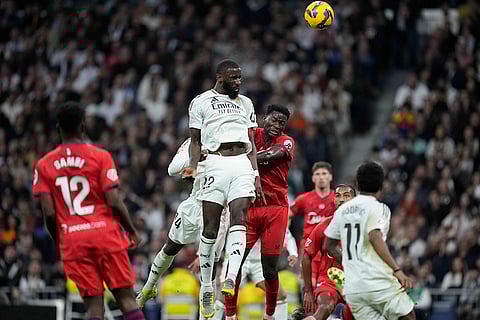 La Liga 2024-25: Real Madrid's Antonio Rudiger goes for the header with Sevilla's Lucien Agoume