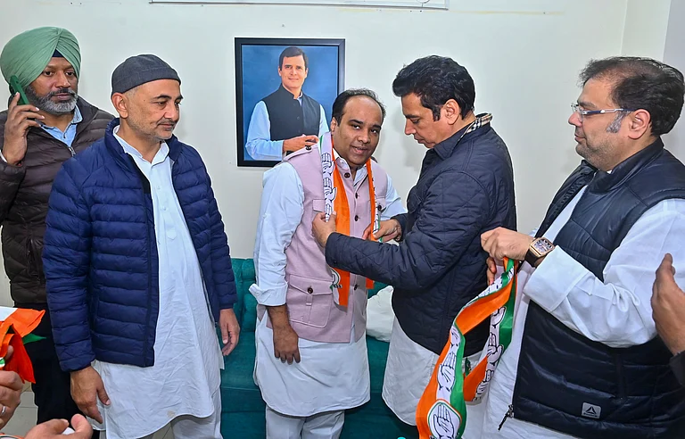Former Matia Mahal MLA Asim Ahmed Khan joins the Congress ahead of Delhi Assembly elections scheduled in 2025, in New Delhi, Monday, Dec. 23, 2024. - PTI