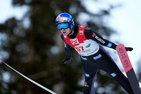 Austria Nordic Combined World Cup: Vinzenz Geiger, of Germany, soars through the air