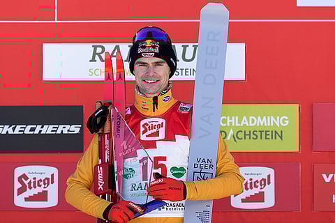Austria Nordic Combined World Cup: Vinzenz Geiger, of Germany, poses on the podium