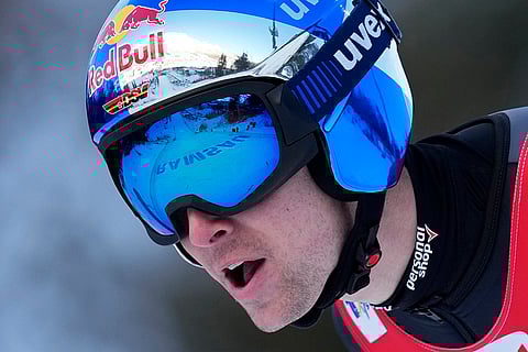 Austria Nordic Combined World Cup: The landing area is reflected on the goggles and helmet of Vinzenz Geiger
