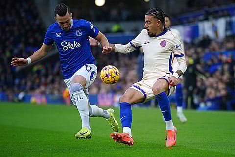 EPL 2024-25: Everton's Jack Harrison and Chelsea's Malo Gusto (right) battle for the ball