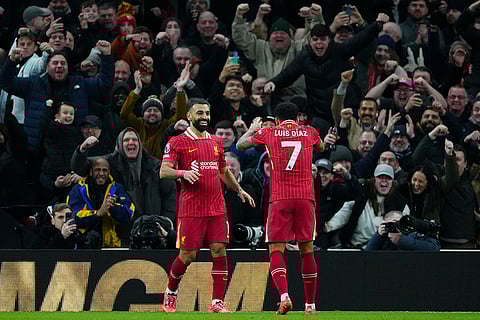 EPL 2024-25: Liverpool's Mohamed Salah, left, celebrates with teammate Luis Diaz after scoring his side's fifth goal