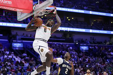 NBA 2024-25: Nuggets center DeAndre Jordan (6) slam dunks 0ver Pelicans forward Herbert Jones