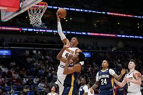 NBA 2024-25: Pelicans guard Javonte Green (4) goes to the basket