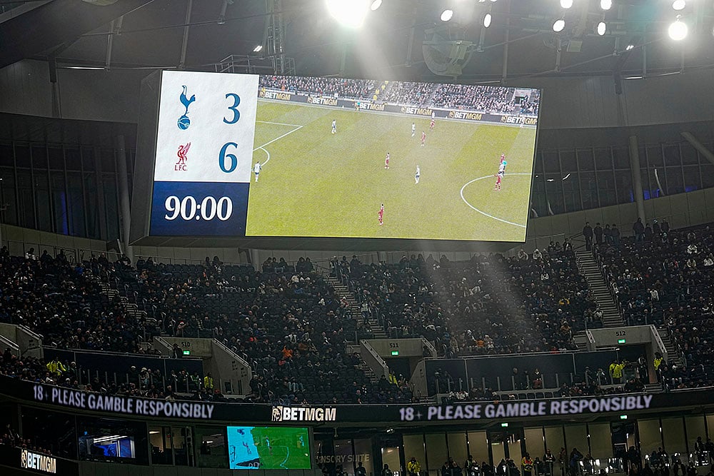 | Photo: AP/Dave Shopland : EPL 2024-25: The score is displayed on a big screen 