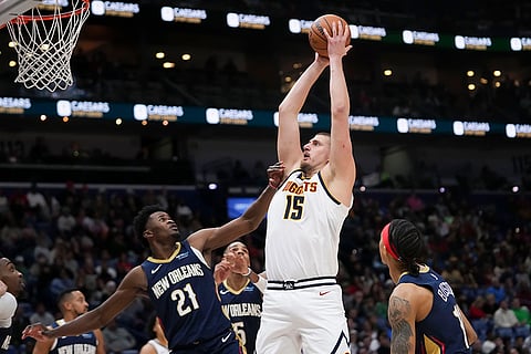 NBA 2024-25: Nuggets center Nikola Jokic (15) shoots against Pelicans