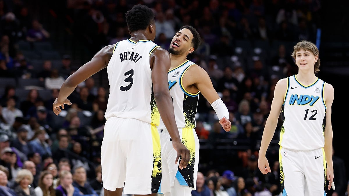 Thomas Bryant and Tyrese Haliburton of the Indiana Pacers celebrate vs. the Sacramento Kings.