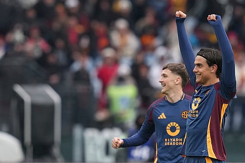 Serie A 2024-25: Roma's Paulo Dybala, right, celebrates after scoring his side's third goal