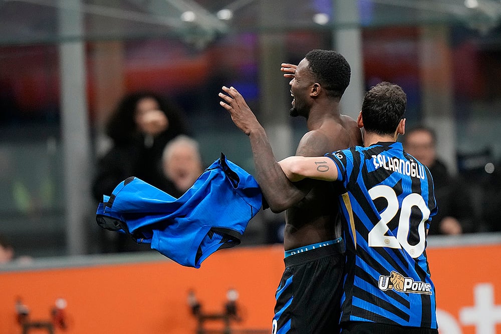 | Photo: AP/Luca Bruno : Serie A 2024-25: Inter Milan's Marcus Thuram celebrates after scoring the second goal