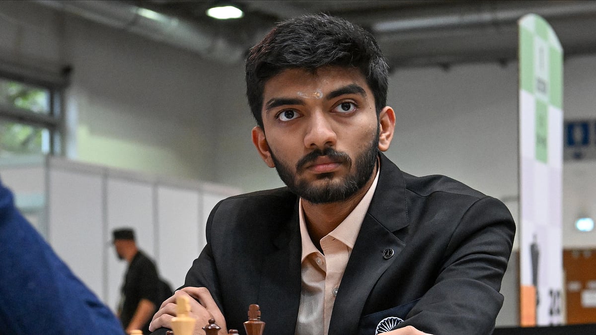 Tibor Illyes/MTI via AP, File : Gukesh D of India looks on as he plays against Richard Rapport of Hungary during the Hungary vs India match in the 6th round of the 45th Chess Olympiad in Budapest.