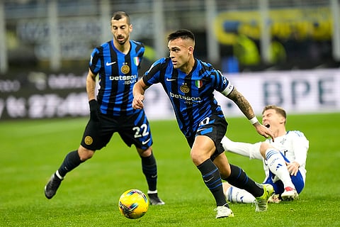 Serie A 2024-25: Inter Milan's Lautaro Martinez, center, controls the ball