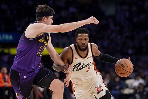 NBA 2024-25: Pistons guard Malik Beasley dribbles around Los Angeles Lakers guard Austin Reaves
