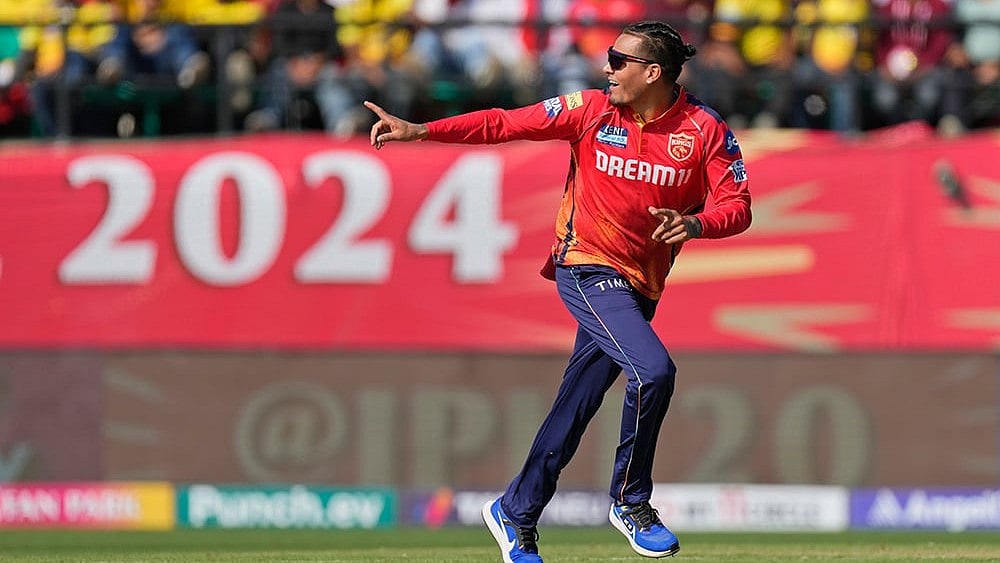 | Photo: AP/Ashwini Bhatia : File photo of Rahul Chahar in action for Punjab Kings in Indian Premier League 2024.