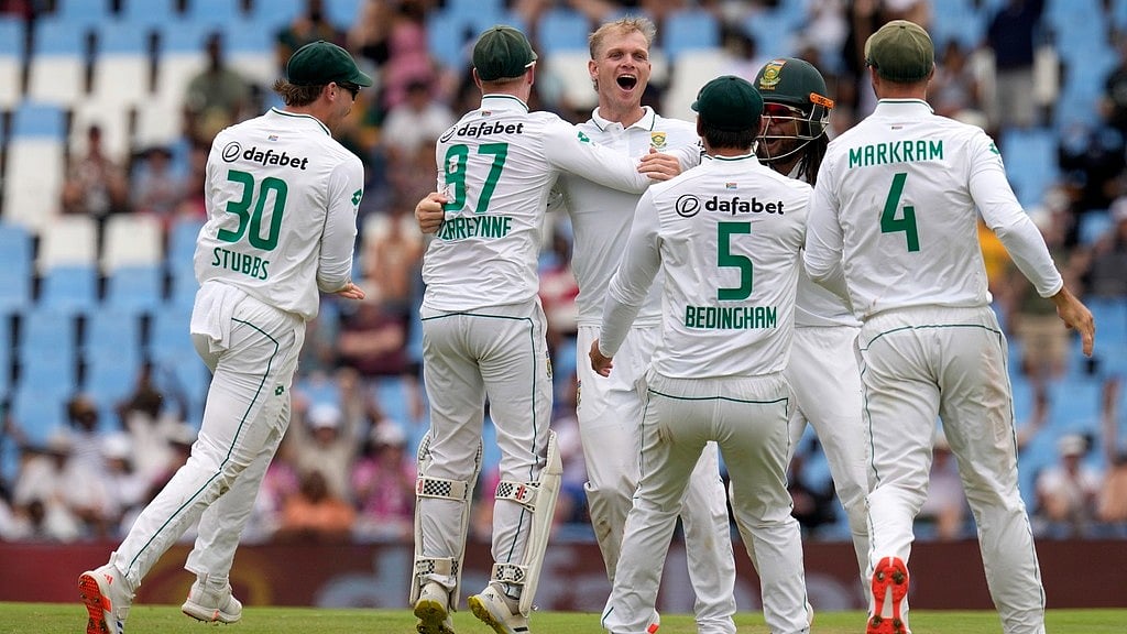 AP : Corbin Bosch, centre, celebrates with teammates after taking the wicket of Shan Masood during the Boxing Day Test between South Africa and Pakistan in Centurion.