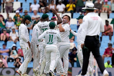 SA vs PAK 1st Test Day 1: South Africa's Dane Paterson, centre, celebrates after dismissing Pakistan's Saim Ayub