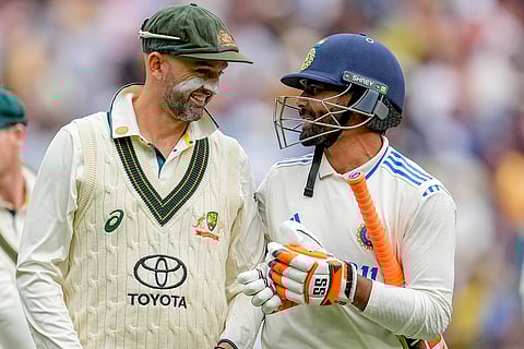India Vs Australia, 4th Test Day 2: India's Ravindra Jadeja, right, talks to Australia's Nathan Lyon as they walk off the field on the end of play