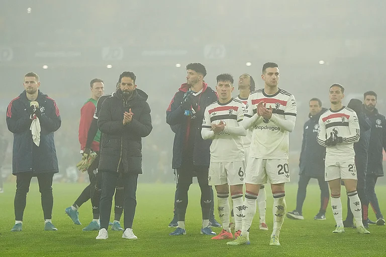 EPL 2024–25: Ruben Amorim, manager of Manchester United, second from left, and his team cheer on the supporters - | Photo: Nick Potts/PA via AP