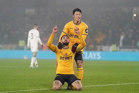 EPL 2024-25: Wolves Matheus Cunha celebrates after Hwang Hee-Chan, top, scored their side's second goal