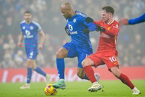EPL 2024-25: Leicester's Jordan Ayew, left, and Liverpool's Alexis Mac Allister battle for the ball