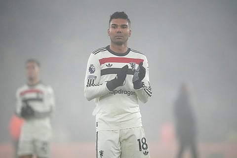 EPL 2024-25: Manchester United's Casemiro applauds the fans after the match