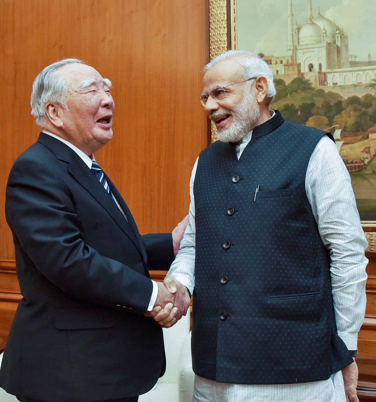 PTI : Former Suzuki Motor Corp Chairman Osamu Suzuki with Indian PM Narendra Modi