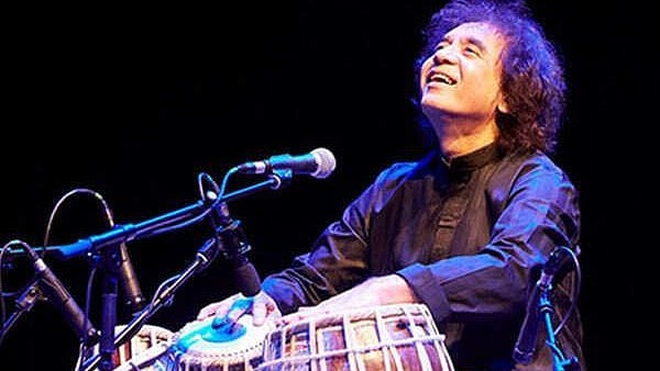 X : Zakir Hussain