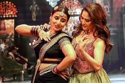 Actors Vidya Balan and Madhuri Dixit