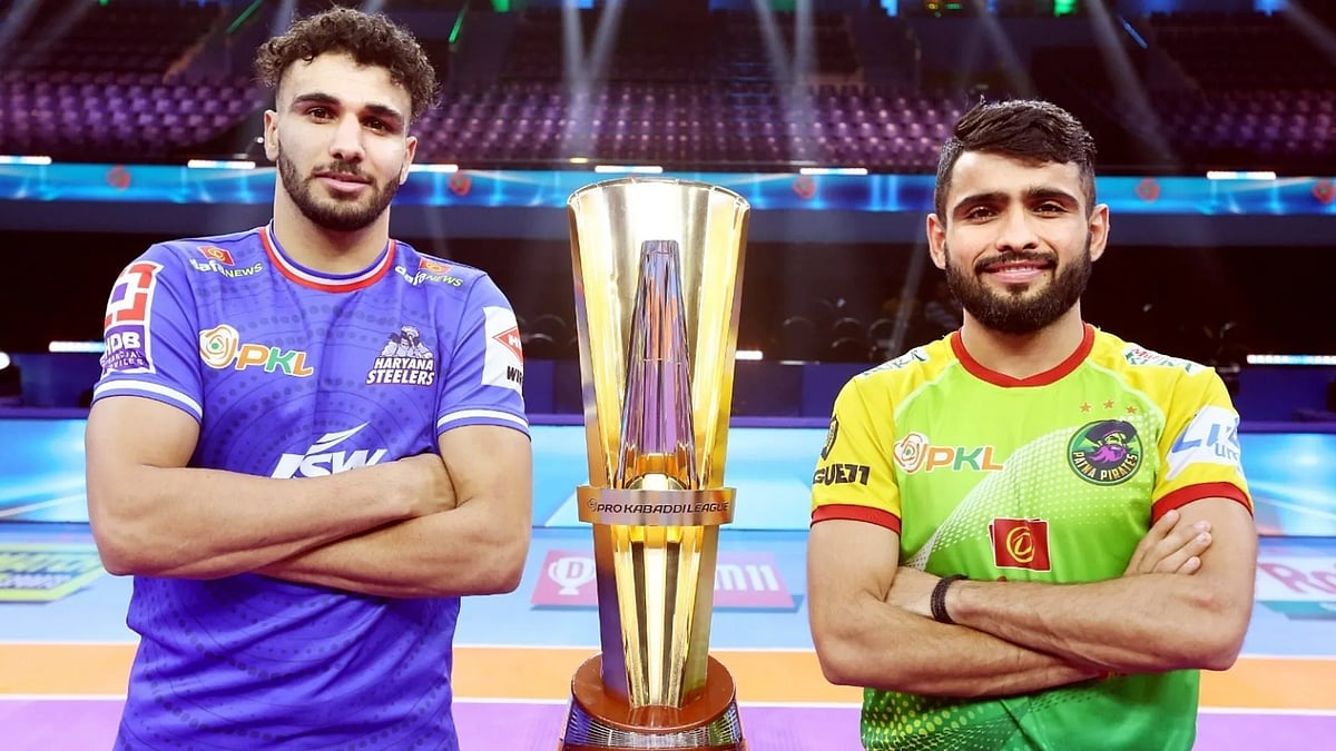Pro Kabaddi League : Captains Jaideep (left) and Ankit pose with the Pro Kabaddi League trophy ahead of the final between Haryana Steelers and Patna Pirates.