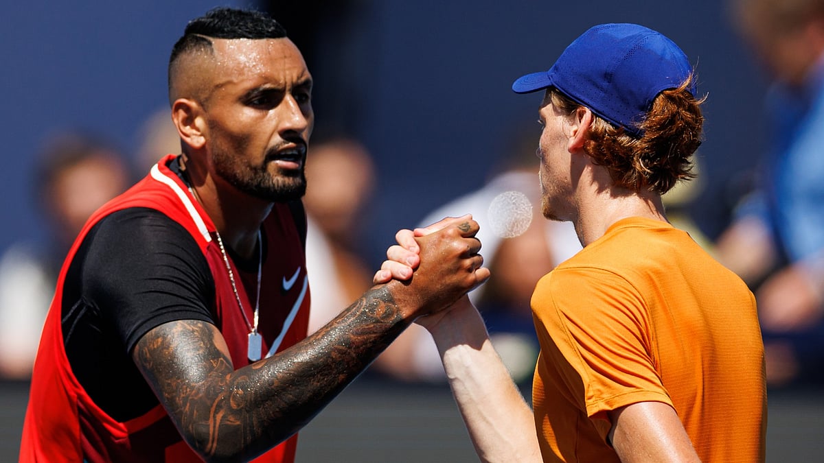 Jannik Sinner with Nick Kyrgios