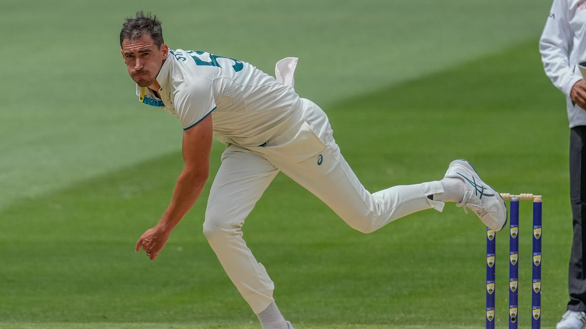Australia's Mitchell Starc bowls a delivery during play on the third day of the fourth cricket test between Australia and India at the Melbourne Cricket Ground, Melbourne. - AP Photo/Asanka Brendon Ratnayake