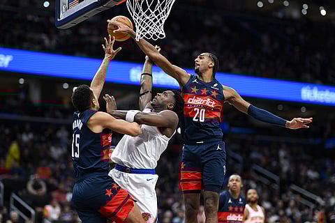 NBA: Knicks forward OG Anunoby (8) has his shot blocked by Wizards forward Alexandre Sarr
